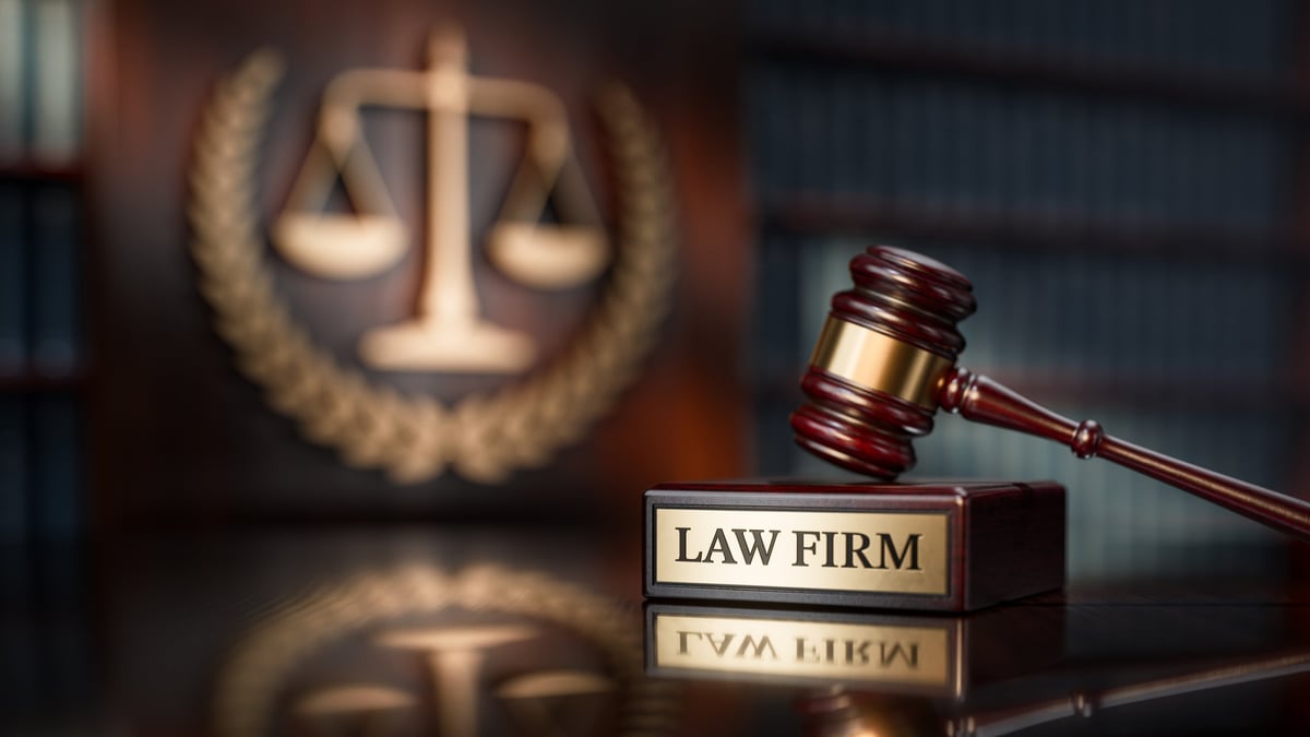 Judge's gavel resting on a wooden stand