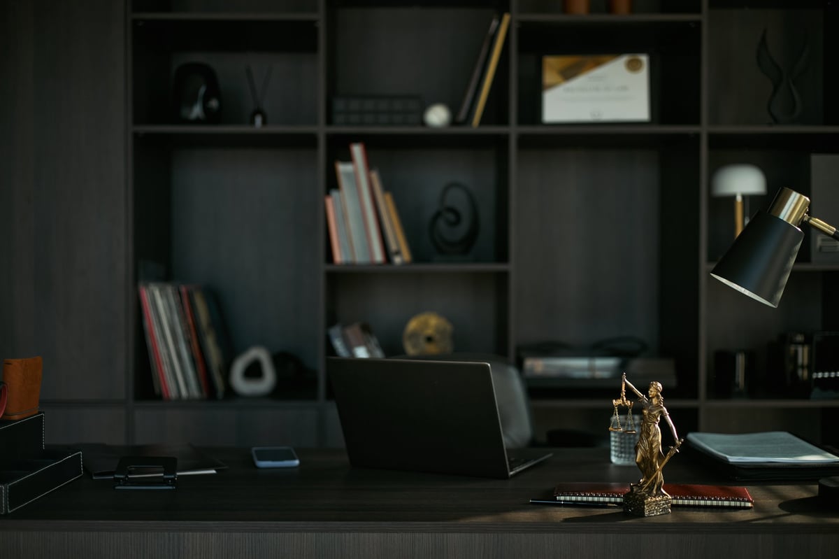 Real estate closing desk with legal files and documents